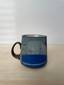 Forrest with blue mug