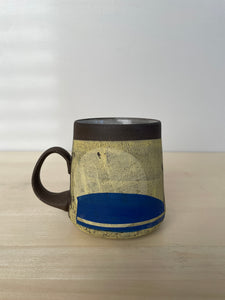Sunshine with blue mug