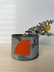 Evergreen and flame orange succulent holder