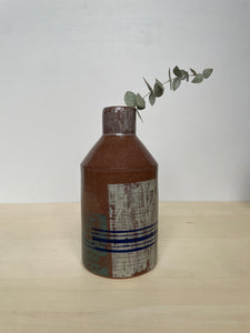 Forest and blue flower vase