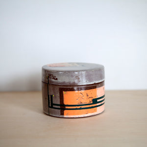 Salmon and green spice jar