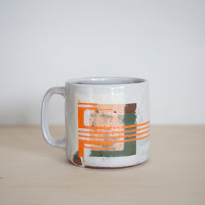 Orange and green mug