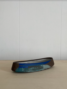Sea green and blue boat