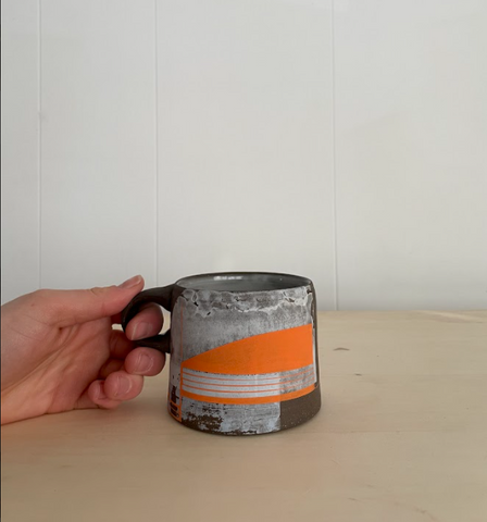 Baby blue and orange coffee mug
