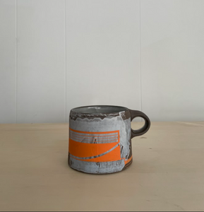 Baby blue and orange coffee mug