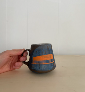 Deep blue and orange coffee mug