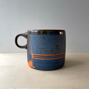 Mazarine and orange coffee mug